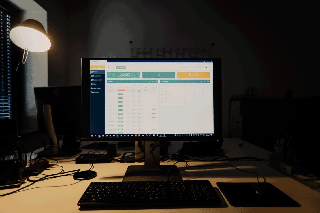 Batch geocoding: Geocoder with open batch project on a monitor at night